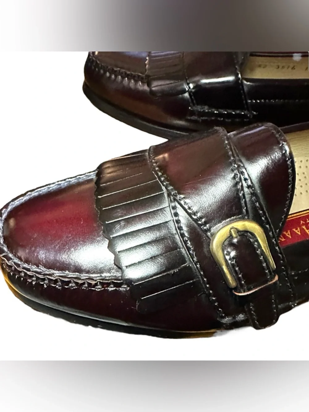 Cole Haan Pinch Buckle Kiltie Loafer (Style 03516) in a burgundy leather finish